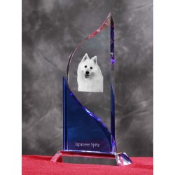 Japanese Spitz. Figurina di cristallo con un immagine di cane.