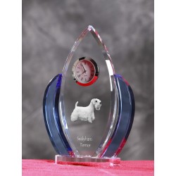 Sealyham terrier- crystal clock in the shape of the wings with the image of a purebred dog.