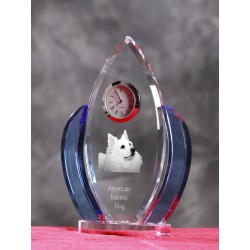 American eskimo dog- crystal clock in the shape of the wings with the image of a purebred dog.